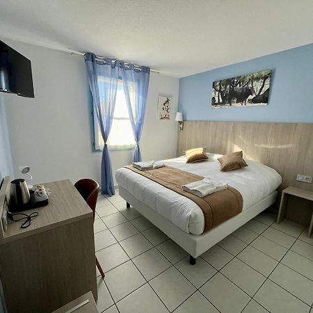 Hotel Les Arcades Сент-Мари-де-ла-Мер Экстерьер фото